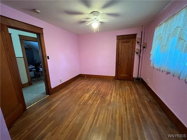2461 Linwood Ave, Niagara Falls, NY 14305 - unfurnished room featuring dark wood-style floors and a ceiling fan