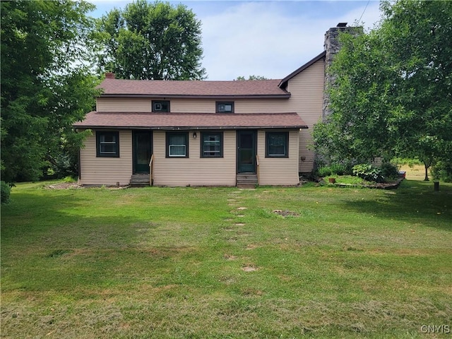 5465 Ridge Rd, Fleming, NY 13021 - view of front of property with entry steps, a chimney, and a front lawn