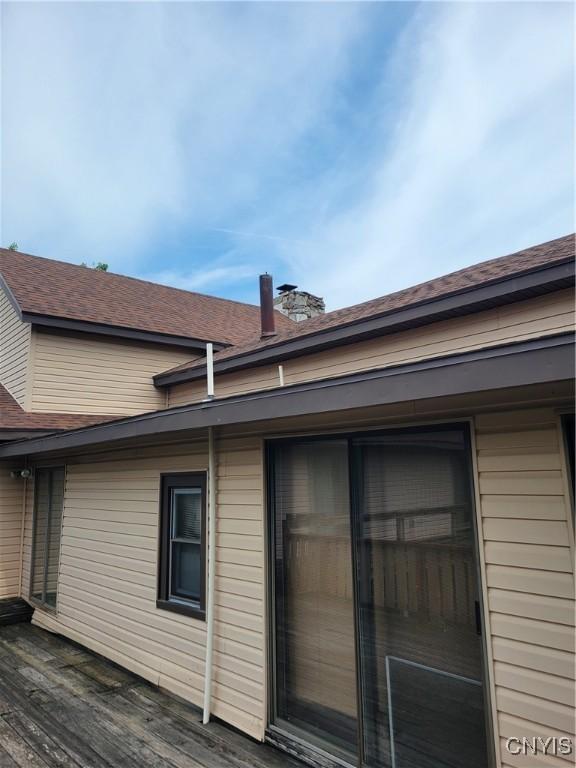 5465 Ridge Rd, Fleming, NY 13021 - view of side of property with a deck