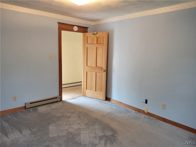 5465 Ridge Rd, Fleming, NY 13021 - spare room featuring a baseboard heating unit and carpet floors