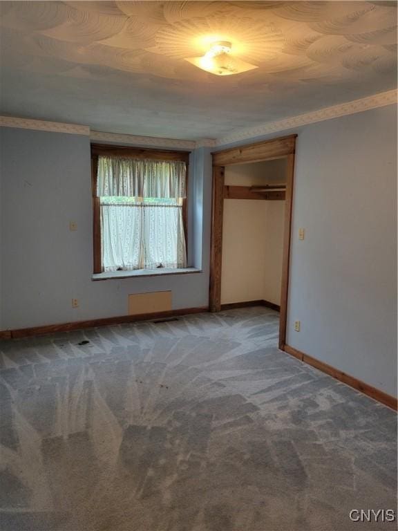 5465 Ridge Rd, Fleming, NY 13021 - unfurnished bedroom with carpet and a closet