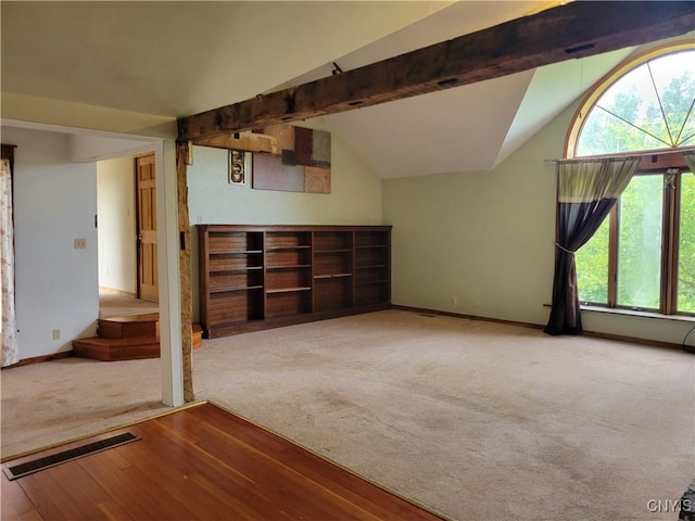 5465 Ridge Rd, Fleming, NY 13021 - unfurnished living room with vaulted ceiling and carpet