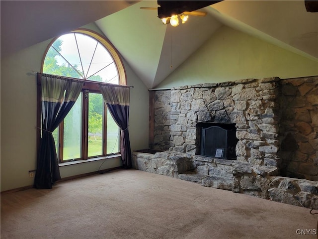 5465 Ridge Rd, Fleming, NY 13021 - unfurnished living room with carpet, ceiling fan, a fireplace, and high vaulted ceiling