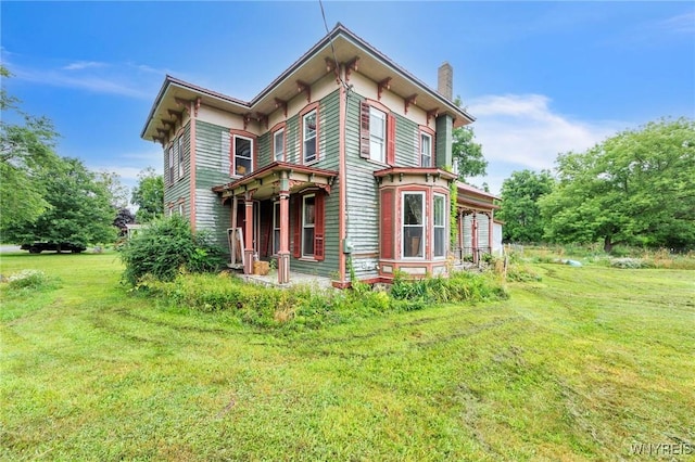 6192 Scudder Rd, Bath, NY 14879 - back of property with a chimney and a yard
