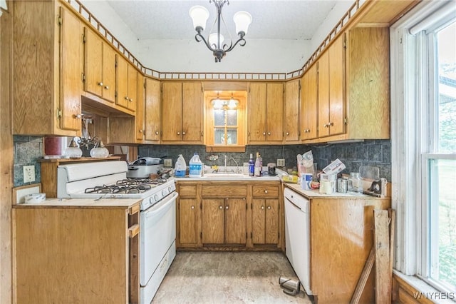 6192 Scudder Rd, Bath, NY 14879 - kitchen with white appliances, a chandelier, decorative backsplash, and light countertops