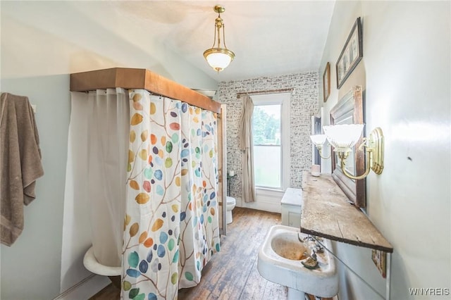 6192 Scudder Rd, Bath, NY 14879 - bathroom with wood finished floors and a shower with shower curtain