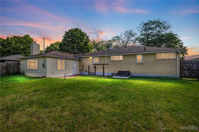 202 Waltercrest, West Seneca, NY 14224 - rear view of property with a chimney, brick siding, and a patio area