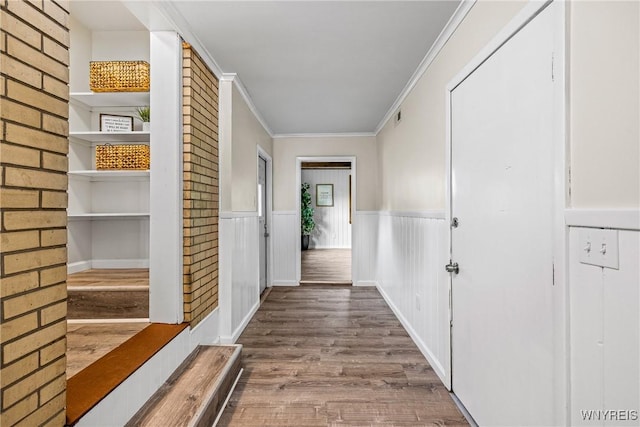 202 Waltercrest, West Seneca, NY 14224 - hallway featuring wood finished floors, a wainscoted wall, and crown molding