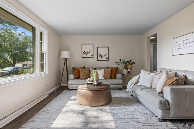 202 Waltercrest, West Seneca, NY 14224 - living area with a baseboard radiator and wood finished floors