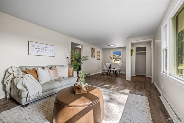 202 Waltercrest, West Seneca, NY 14224 - living area with baseboard heating and wood finished floors