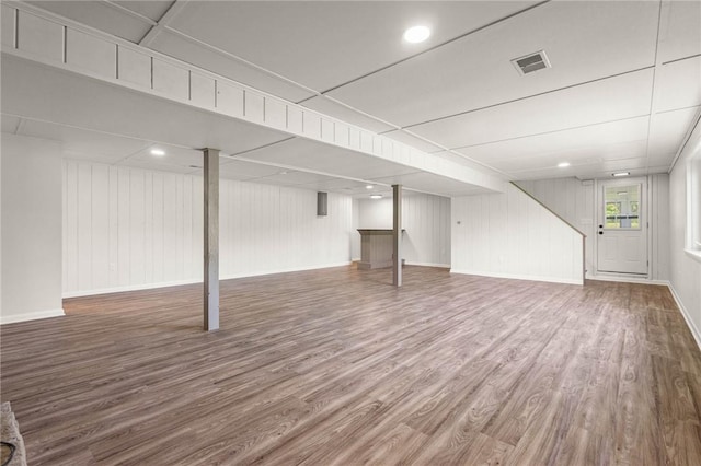8281 E Main Rd, Leroy, NY 14482 - below grade area featuring wood finished floors and baseboards
