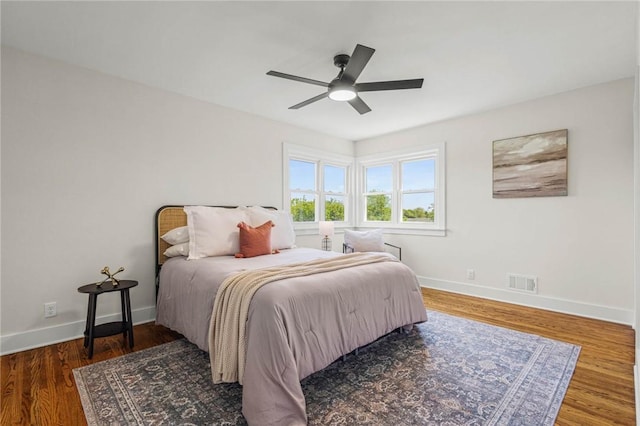 8281 E Main Rd, Leroy, NY 14482 - bedroom featuring wood finished floors and ceiling fan