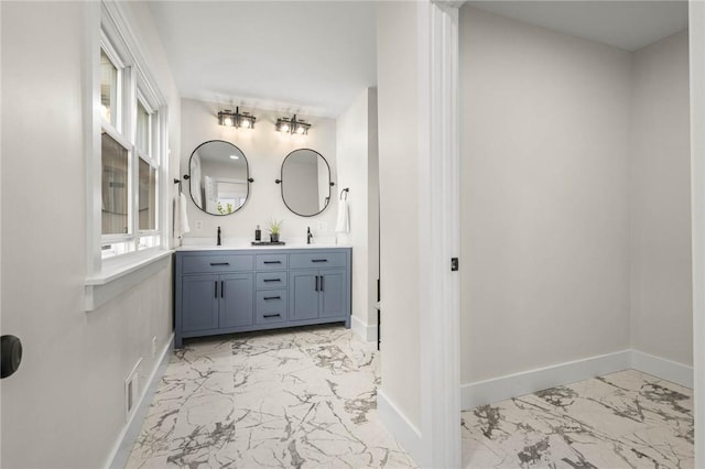 8281 E Main Rd, Leroy, NY 14482 - full bathroom with marble finish floors and double vanity
