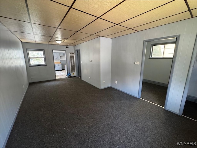 360 Longnecker St, Buffalo, NY 14206 - carpeted spare room featuring baseboards and a drop ceiling