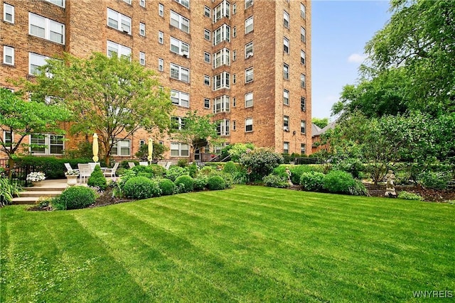surrounding community featuring a lawn