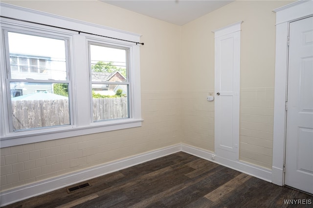 2363 Niagara St, Buffalo, NY 14207 - unfurnished room featuring dark wood-style flooring and wainscoting