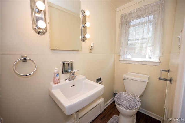 2363 Niagara St, Buffalo, NY 14207 - half bathroom featuring toilet and wood finished floors