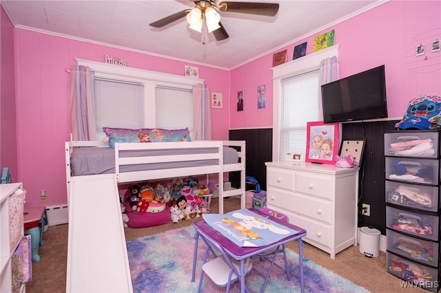 2363 Niagara St, Buffalo, NY 14207 - bedroom featuring crown molding, light colored carpet, a baseboard heating unit, wooden walls, and a ceiling fan