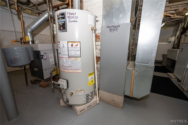 2363 Niagara St, Buffalo, NY 14207 - utility room with gas water heater, washer / dryer, and heating unit