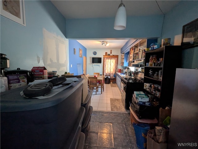 4 Bristol Ave, Lockport City, NY 14094 - kitchen with tile patterned floors, range with gas stovetop, and open shelves