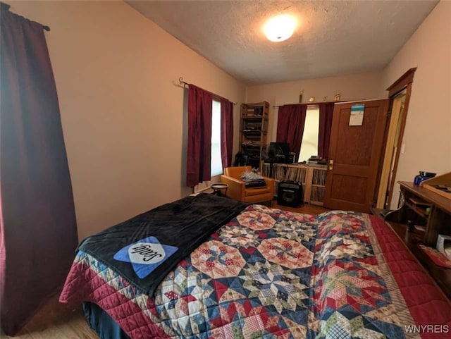 4 Bristol Ave, Lockport City, NY 14094 - bedroom with a textured ceiling