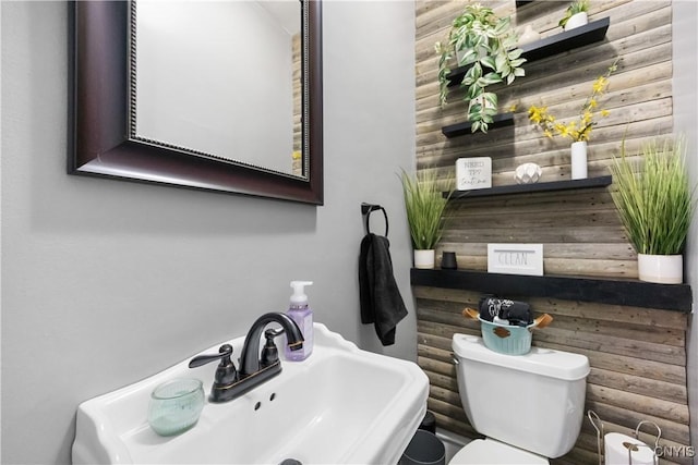 567 Grant Blvd, Syracuse, NY 13203 - half bathroom with a sink and toilet