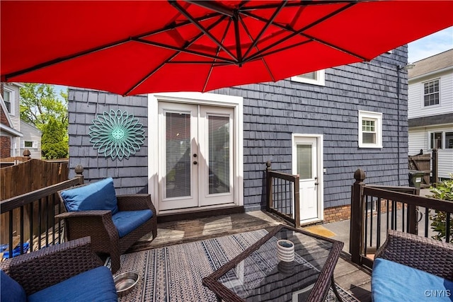 567 Grant Blvd, Syracuse, NY 13203 - wooden deck with french doors and outdoor lounge area