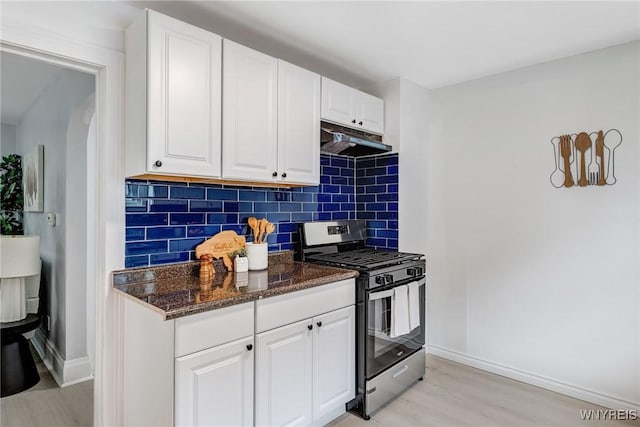 185 N Pleasant Pkwy, Cheektowaga, NY 14206 - kitchen with gas range, under cabinet range hood, light wood finished floors, decorative backsplash, and white cabinetry