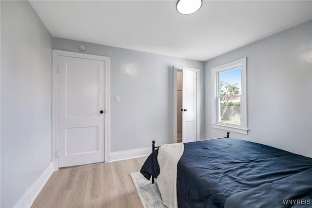 185 N Pleasant Pkwy, Cheektowaga, NY 14206 - bedroom with light wood-style floors and baseboards