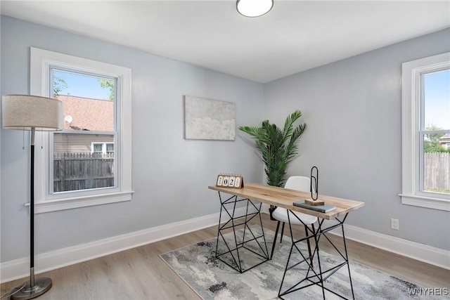 185 N Pleasant Pkwy, Cheektowaga, NY 14206 - home office featuring wood finished floors and healthy amount of natural light