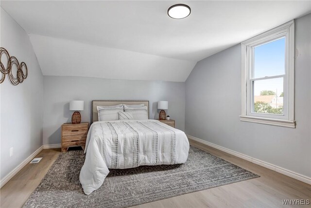 185 N Pleasant Pkwy, Cheektowaga, NY 14206 - bedroom featuring lofted ceiling and wood finished floors
