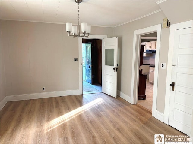 11 Elm St, Hanover, NY 14136 - unfurnished dining area with light wood-type flooring, crown molding, and a chandelier