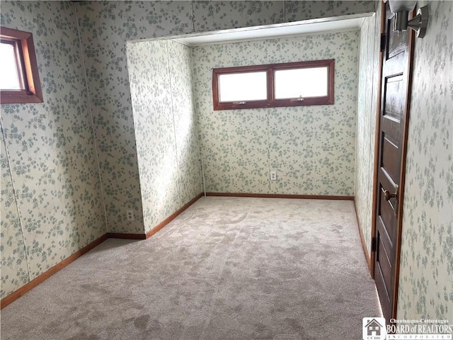 11 Elm St, Hanover, NY 14136 - spare room featuring carpet floors and wallpapered walls