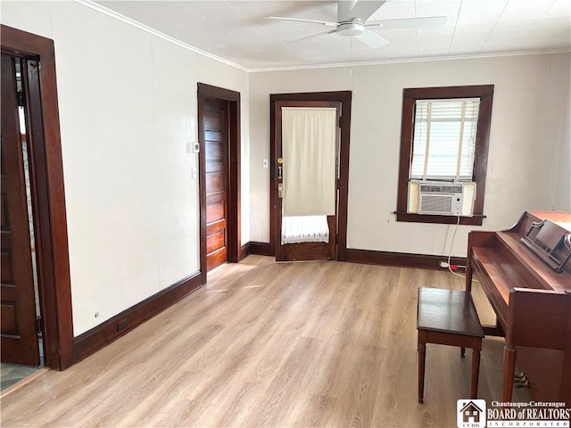 11 Elm St, Hanover, NY 14136 - sitting room with cooling unit, ceiling fan, wood finished floors, and ornamental molding