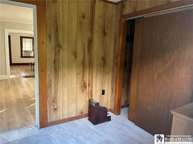 11 Elm St, Hanover, NY 14136 - unfurnished bedroom featuring wooden walls, cooling unit, and crown molding