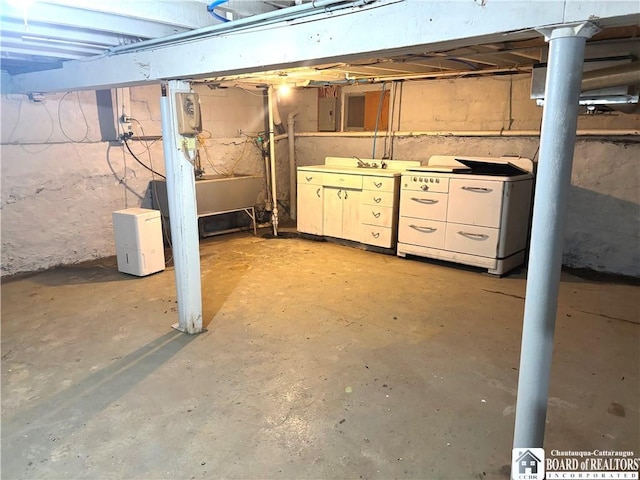 11 Elm St, Hanover, NY 14136 - unfinished below grade area with a sink and electric panel