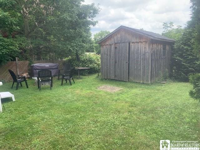 6 Dean St, Randolph, NY 14772 - view of green lawn featuring a storage unit