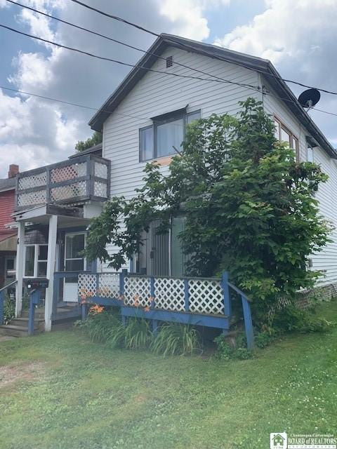 6 Dean St, Randolph, NY 14772 - back of house featuring a yard and a balcony