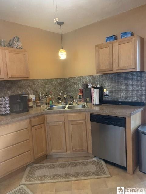 6 Dean St, Randolph, NY 14772 - kitchen featuring stainless steel dishwasher, light brown cabinets, tasteful backsplash, and hanging light fixtures