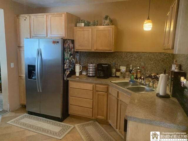 6 Dean St, Randolph, NY 14772 - kitchen with stainless steel refrigerator with ice dispenser, light brown cabinetry, backsplash, and hanging light fixtures