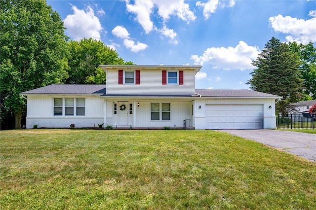 42 Twin Circle Dr, Gates, NY 14624 - traditional-style home featuring asphalt driveway, an attached garage, covered porch, and a shingled roof