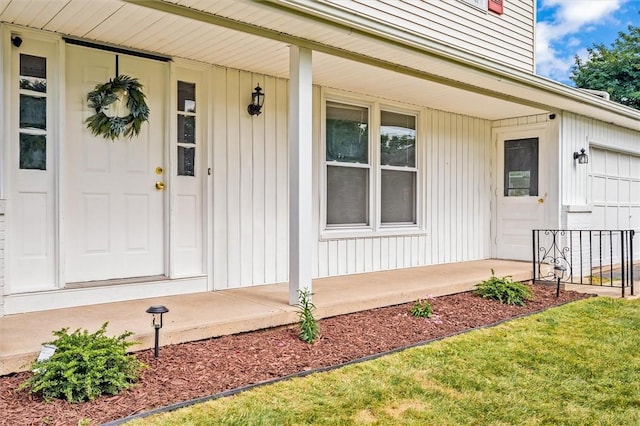 42 Twin Circle Dr, Gates, NY 14624 - doorway to property featuring a porch