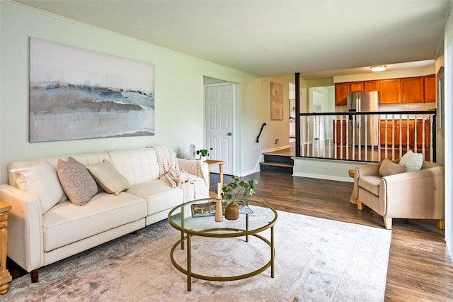 42 Twin Circle Dr, Gates, NY 14624 - living room featuring wood finished floors, crown molding, and stairway