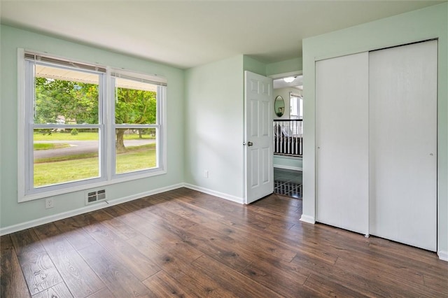 42 Twin Circle Dr, Gates, NY 14624 - unfurnished bedroom with wood finished floors and a closet