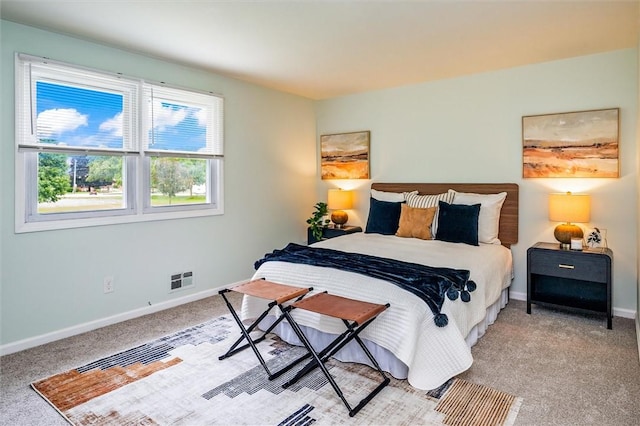 42 Twin Circle Dr, Gates, NY 14624 - bedroom with baseboards and light carpet