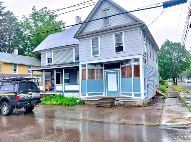 550 Spaulding St, Elmira City, NY 14904 - victorian home featuring entry steps and covered porch