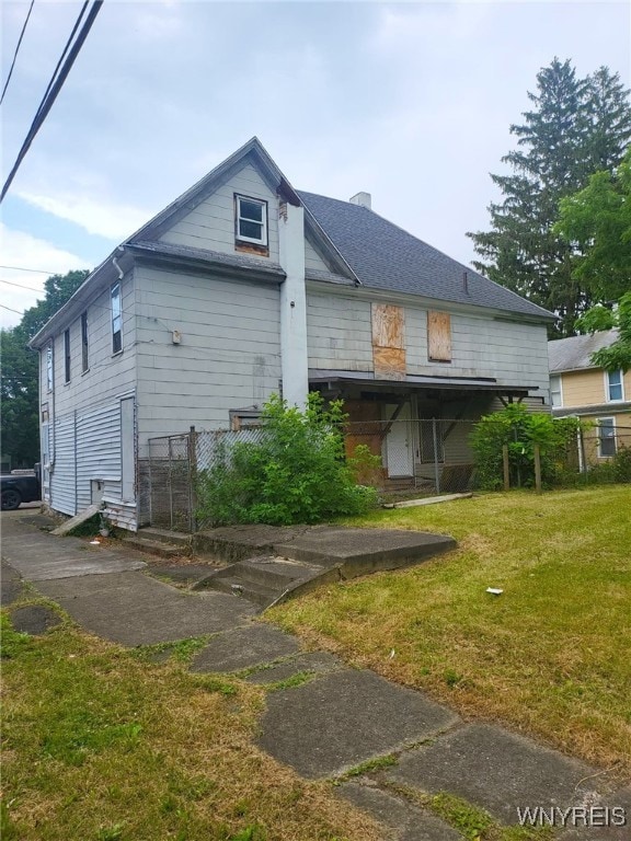 550 Spaulding St, Elmira City, NY 14904 - view of property exterior with a yard and a chimney