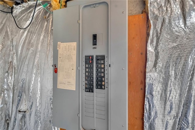 6103 Reger Dr, Lockport Town, NY 14094 - utility room featuring electric panel