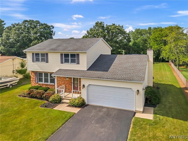 6103 Reger Dr, Lockport Town, NY 14094 - traditional-style home with driveway, a garage, a front lawn, a chimney, and roof with shingles