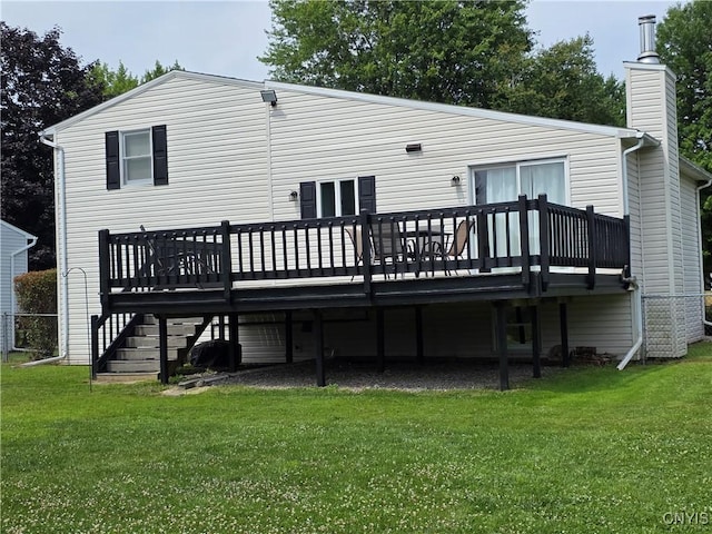 3978 Thrush Ln, Clay, NY 13090 - back of house with a wooden deck, a yard, and a chimney